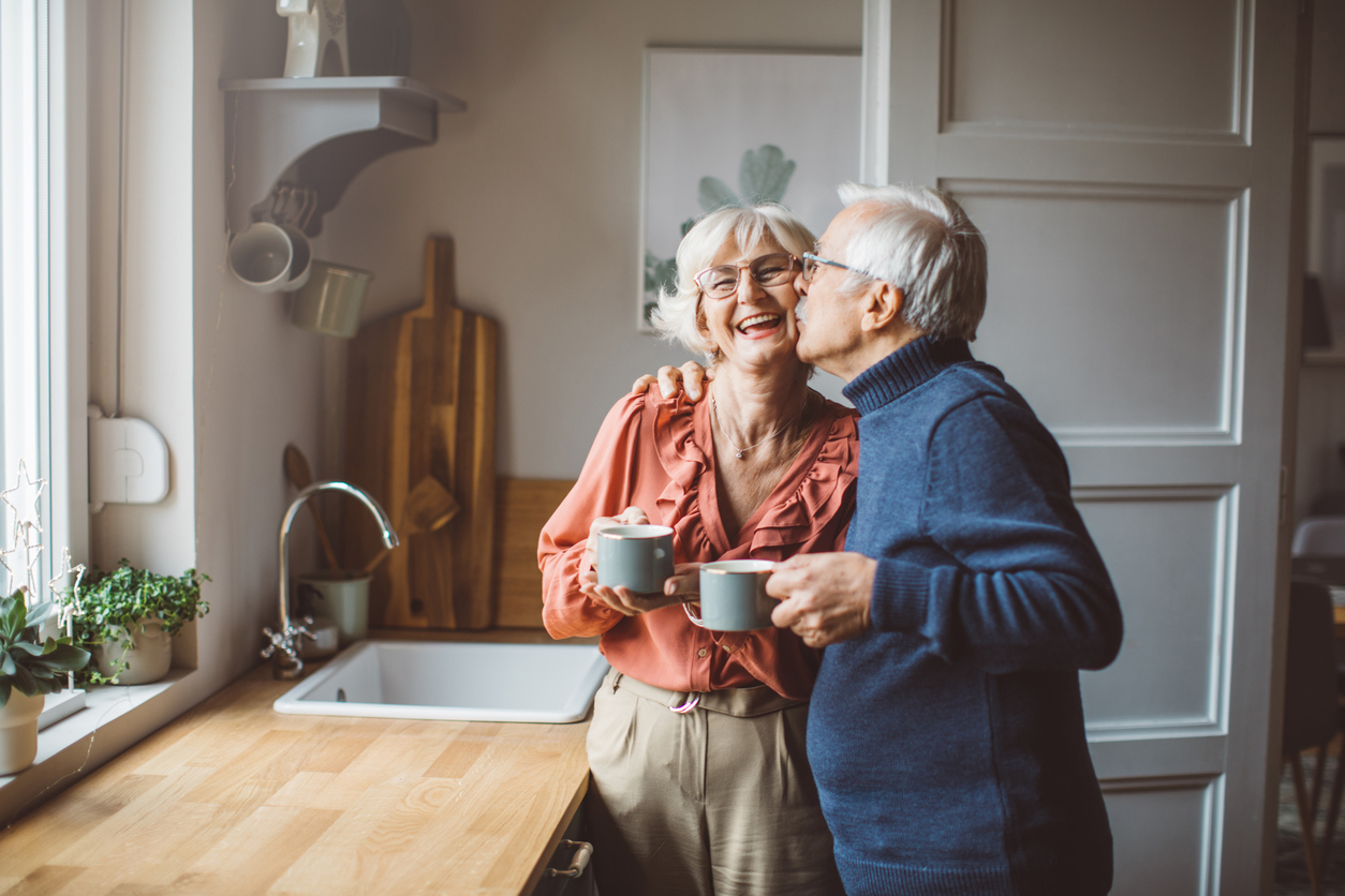 Elderly couple enjoying the view outside a peaceful assisted living home near Surprise, Arizona